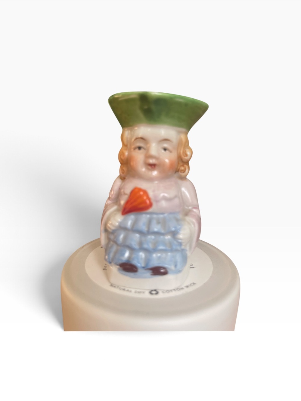 Hand-Painted Ceramic Figurine with Green Hat and Blue Skirt